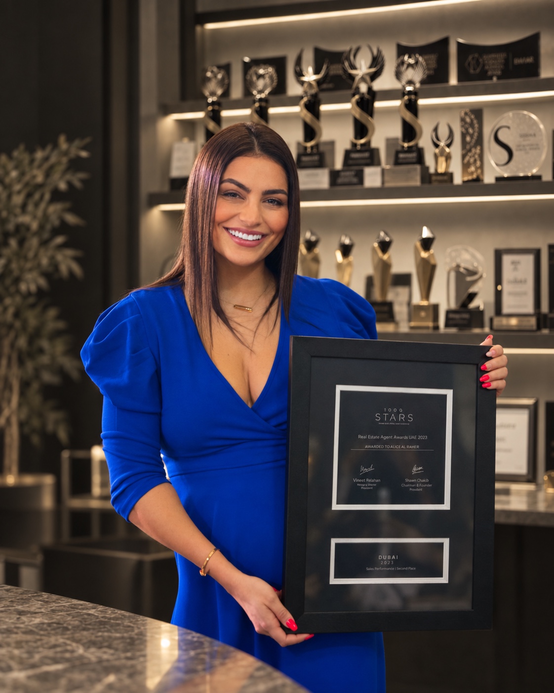 Alice with her named Real Estate Agent Awards certificate