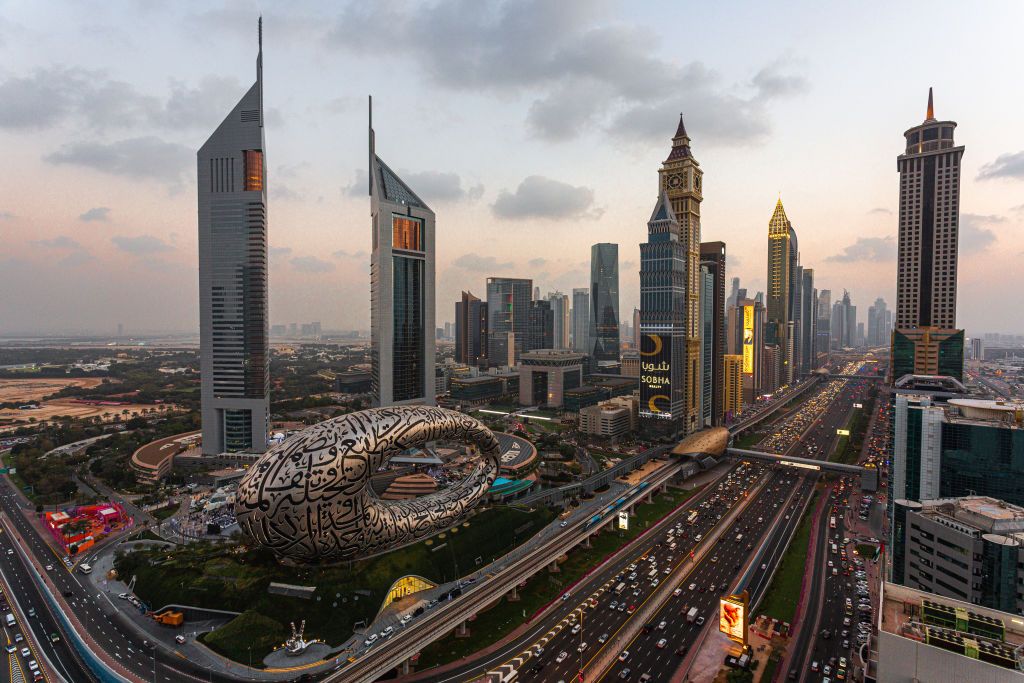 Real elevated photograph of the Museum of the Future, Emirates Towers and Sheikh Zayed Road